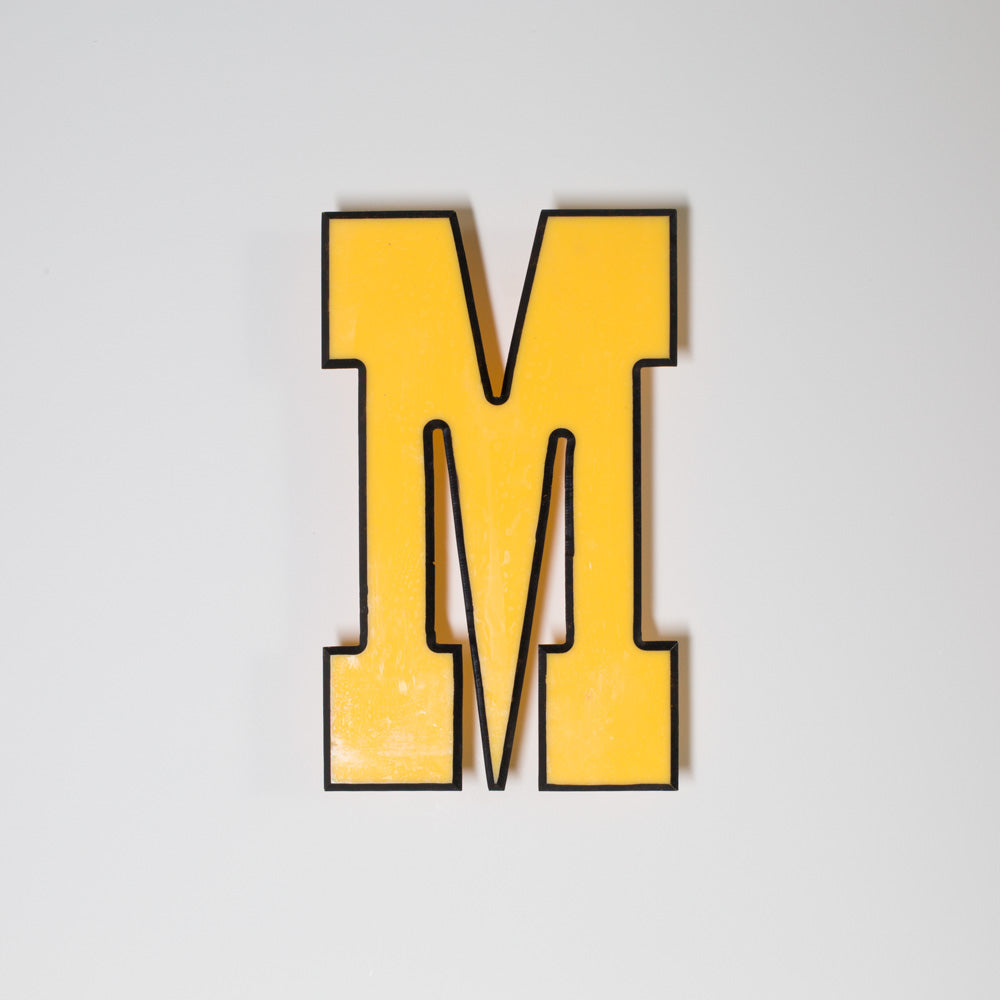 Yellow shop letter signage reclaimed