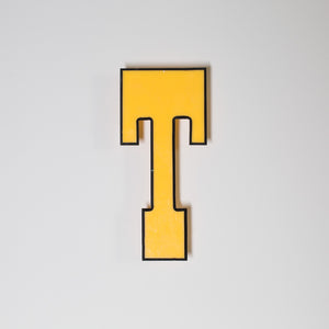 Yellow shop letter signage reclaimed